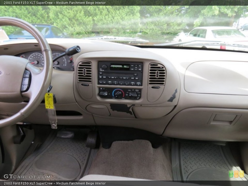 Medium Parchment Beige Interior Dashboard for the 2003 Ford F150 XLT SuperCrew #69644407