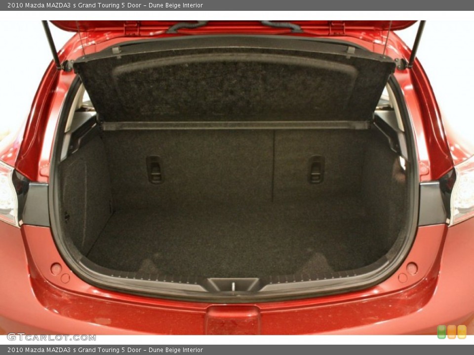 Dune Beige Interior Trunk for the 2010 Mazda MAZDA3 s Grand Touring 5 Door #69645364
