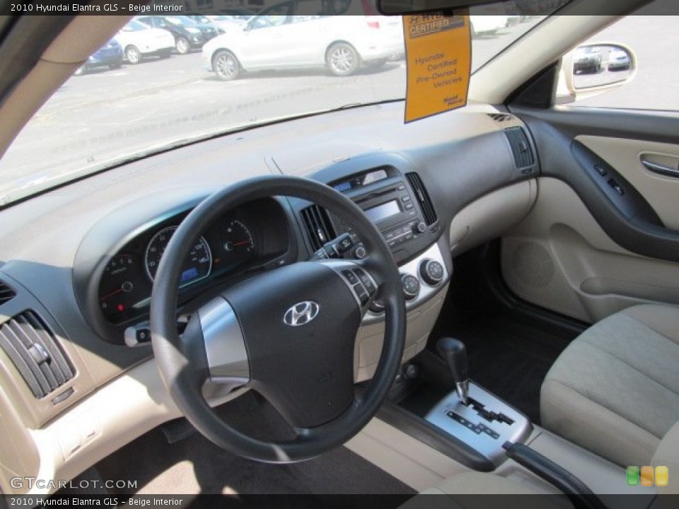 Beige Interior Prime Interior for the 2010 Hyundai Elantra GLS #69708933
