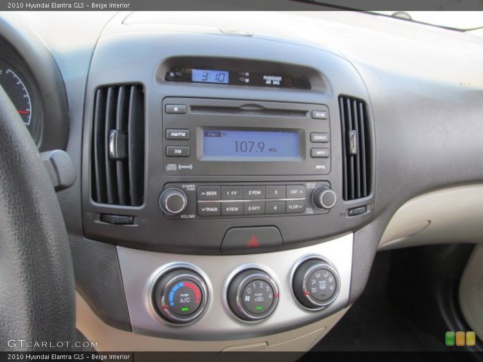 Beige Interior Controls for the 2010 Hyundai Elantra GLS #69708957