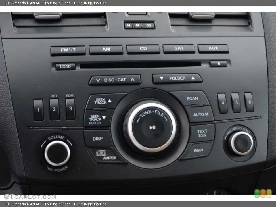 Dune Beige Interior Controls for the 2012 Mazda MAZDA3 i Touring 4 Door #69722652
