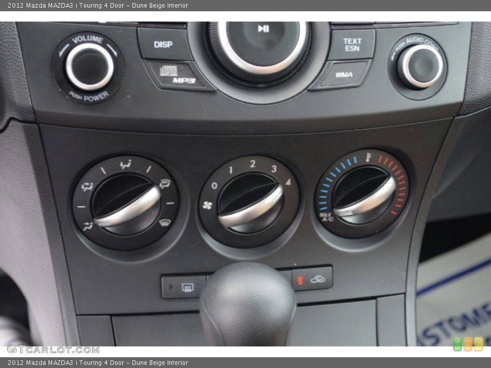 Dune Beige Interior Controls for the 2012 Mazda MAZDA3 i Touring 4 Door #69722655