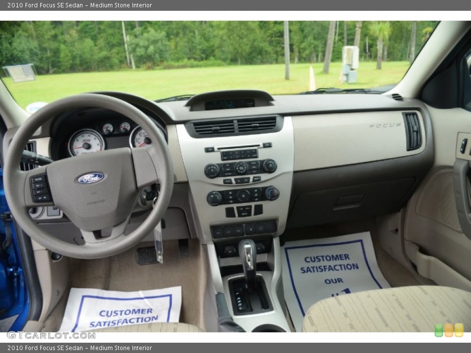 Medium Stone Interior Dashboard for the 2010 Ford Focus SE Sedan #69722712
