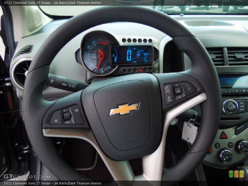 Jet Black/Dark Titanium Interior Steering Wheel for the 2012 Chevrolet Sonic LT Sedan #69729886