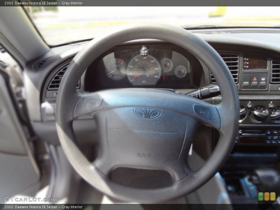 Gray Interior Steering Wheel for the 2002 Daewoo Nubira SE Sedan #69730963