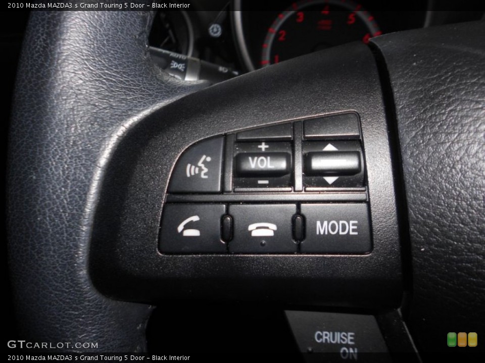 Black Interior Controls for the 2010 Mazda MAZDA3 s Grand Touring 5 Door #69746725