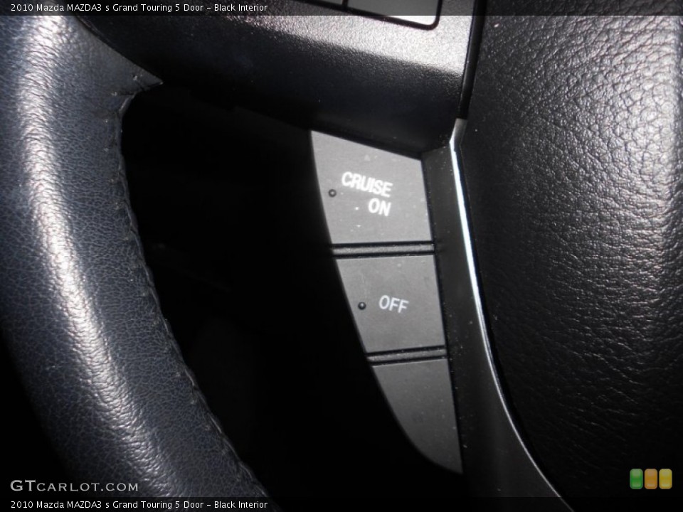 Black Interior Controls for the 2010 Mazda MAZDA3 s Grand Touring 5 Door #69746734