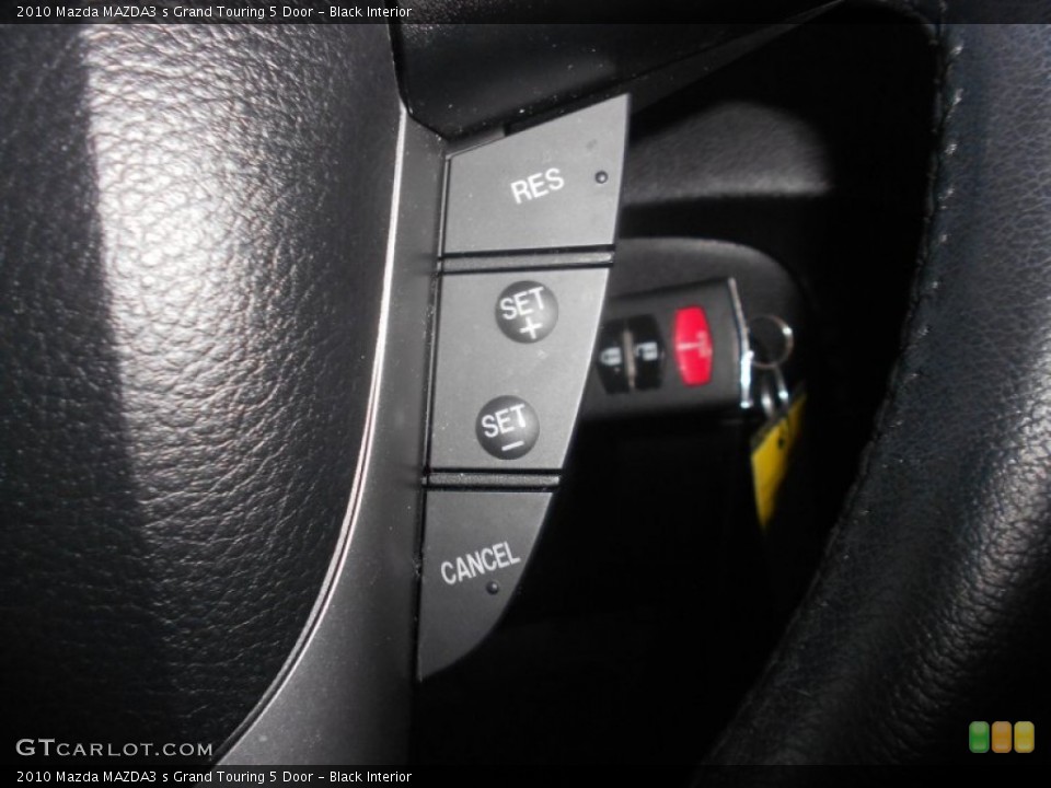 Black Interior Controls for the 2010 Mazda MAZDA3 s Grand Touring 5 Door #69746743