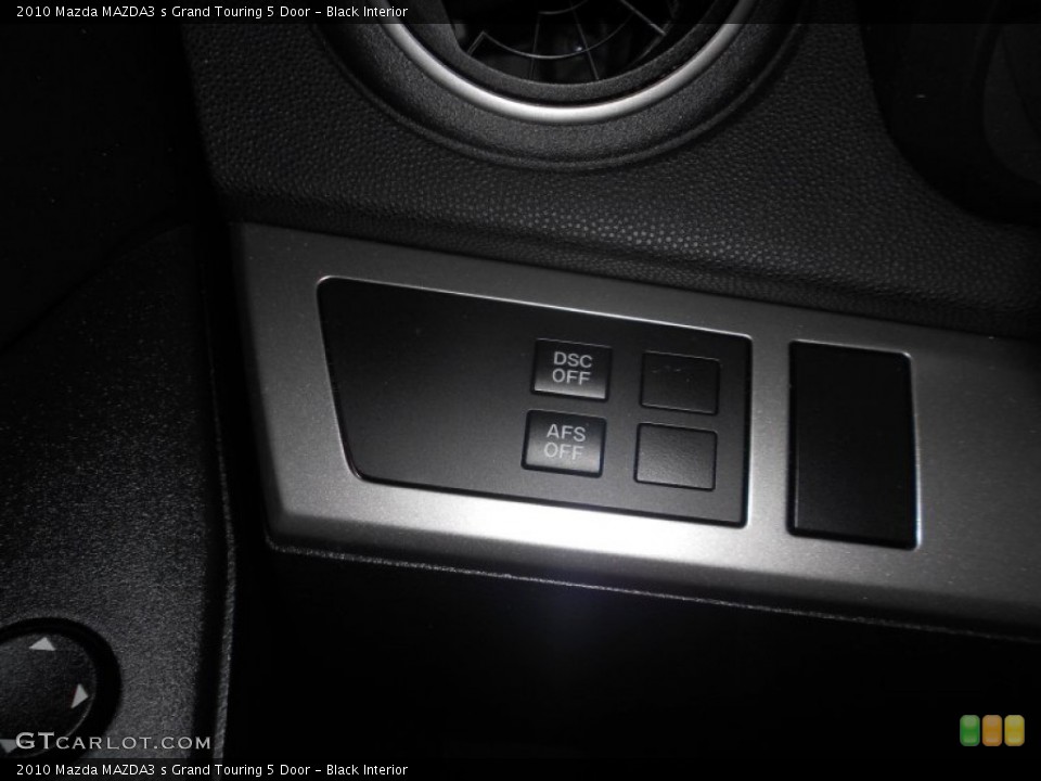 Black Interior Controls for the 2010 Mazda MAZDA3 s Grand Touring 5 Door #69746751