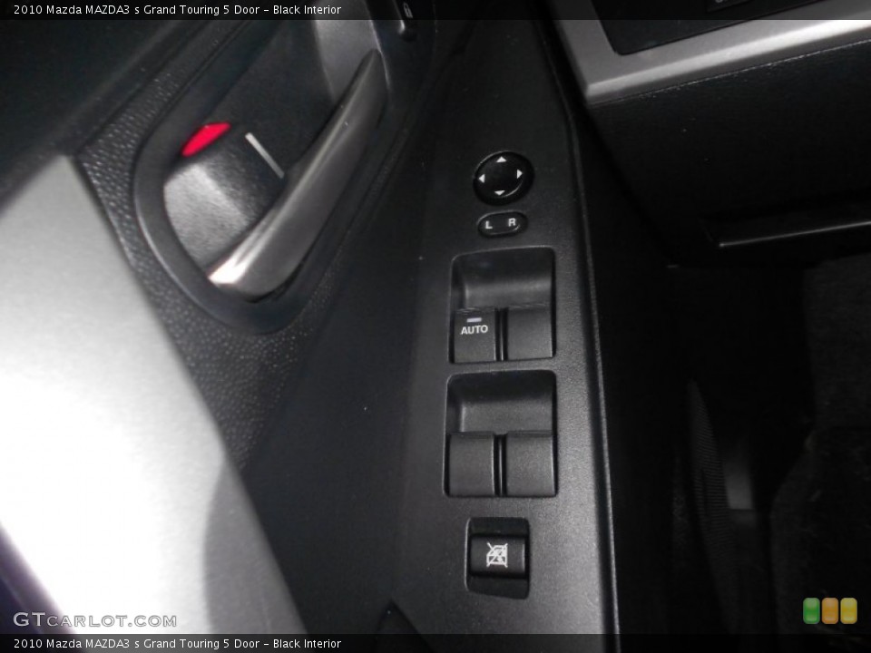 Black Interior Controls for the 2010 Mazda MAZDA3 s Grand Touring 5 Door #69746758