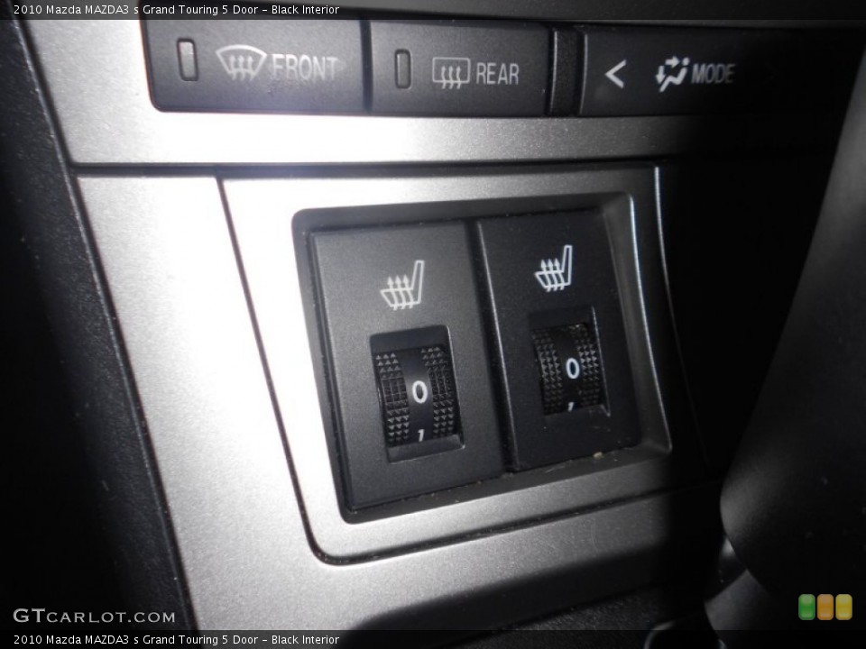 Black Interior Controls for the 2010 Mazda MAZDA3 s Grand Touring 5 Door #69746767