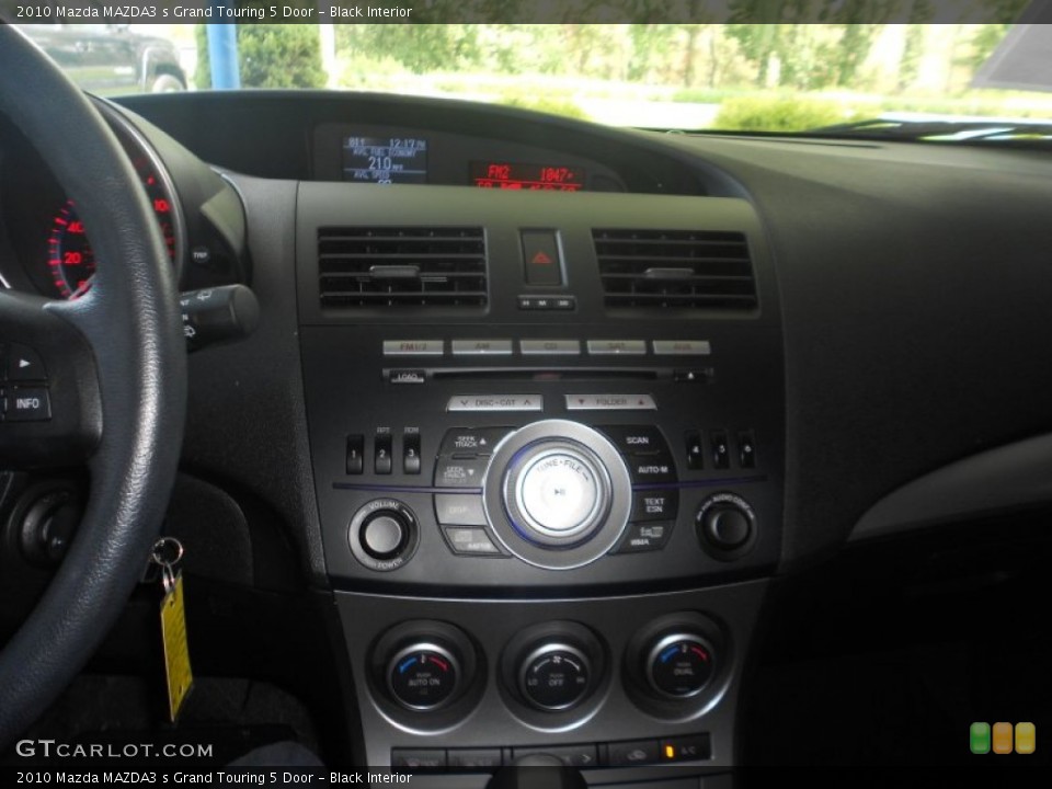 Black Interior Controls for the 2010 Mazda MAZDA3 s Grand Touring 5 Door #69746785
