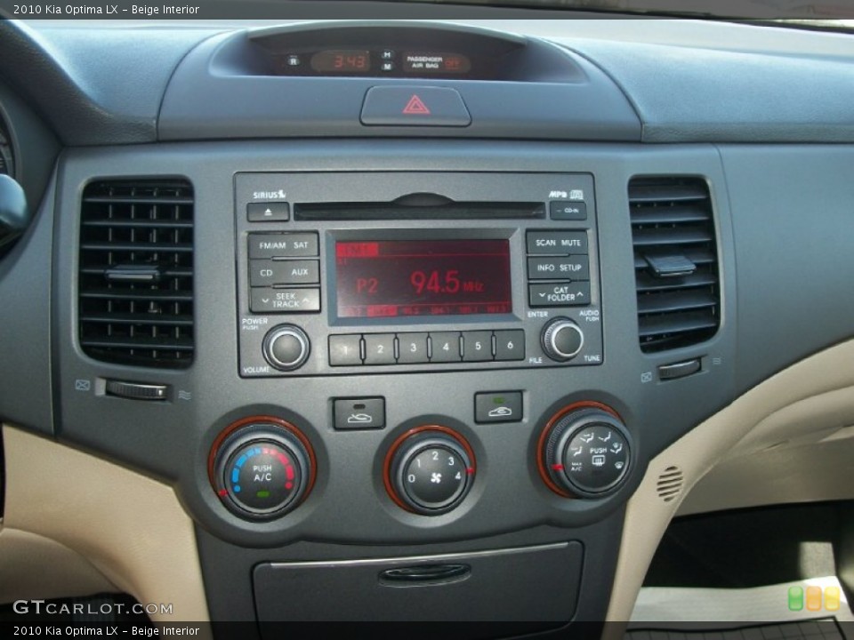 Beige Interior Controls for the 2010 Kia Optima LX #69760957