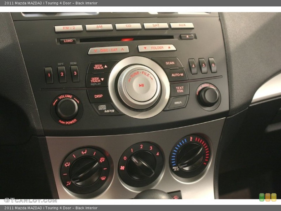 Black Interior Controls for the 2011 Mazda MAZDA3 i Touring 4 Door #69773245