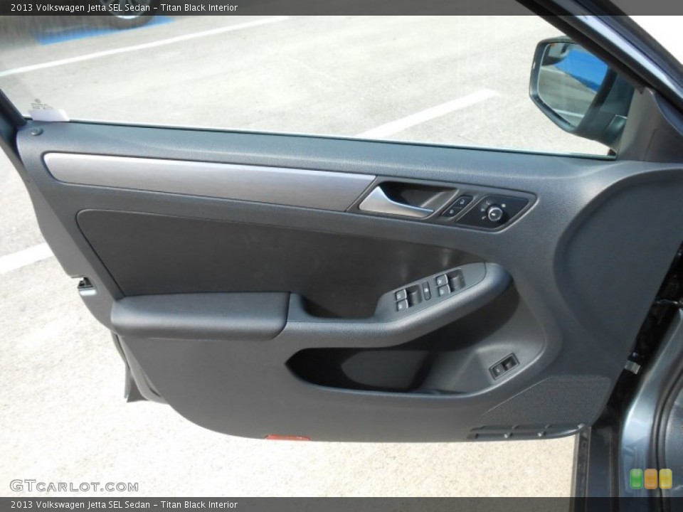 Titan Black Interior Door Panel for the 2013 Volkswagen Jetta SEL Sedan #69815218