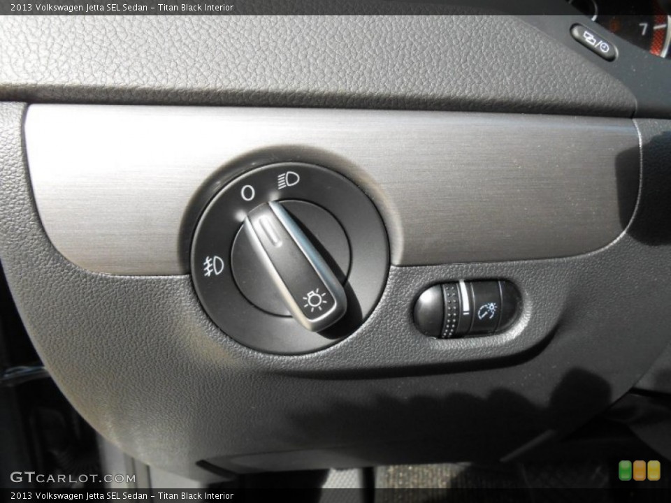Titan Black Interior Controls for the 2013 Volkswagen Jetta SEL Sedan #69815314