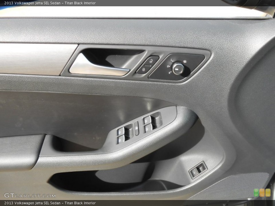 Titan Black Interior Controls for the 2013 Volkswagen Jetta SEL Sedan #69815323
