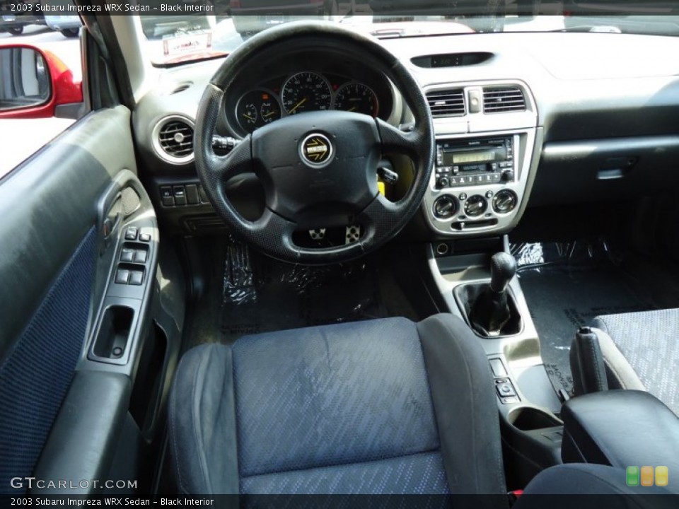 Black Interior Dashboard for the 2003 Subaru Impreza WRX Sedan #69842371