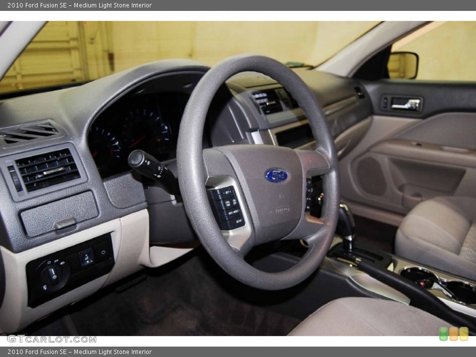 Medium Light Stone Interior Steering Wheel for the 2010 Ford Fusion SE #69845947