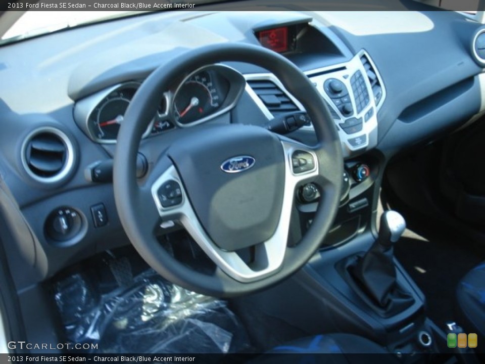 Charcoal Black/Blue Accent Interior Dashboard for the 2013 Ford Fiesta SE Sedan #69867439
