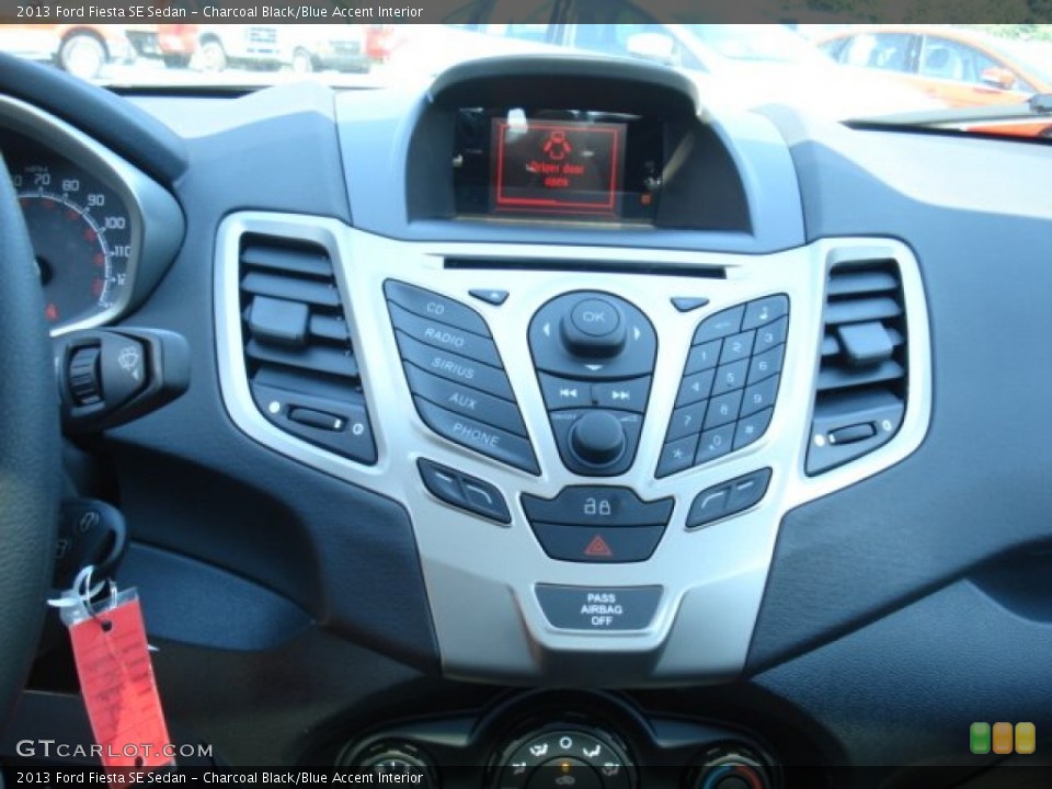 Charcoal Black/Blue Accent Interior Controls for the 2013 Ford Fiesta SE Sedan #69867490