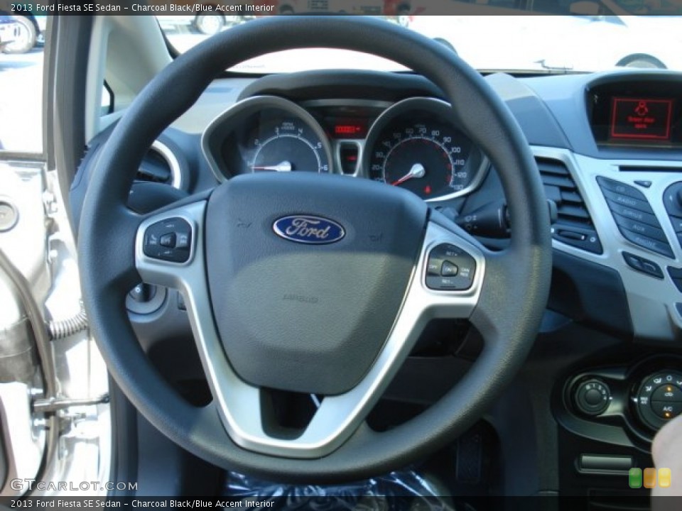 Charcoal Black/Blue Accent Interior Steering Wheel for the 2013 Ford Fiesta SE Sedan #69867508