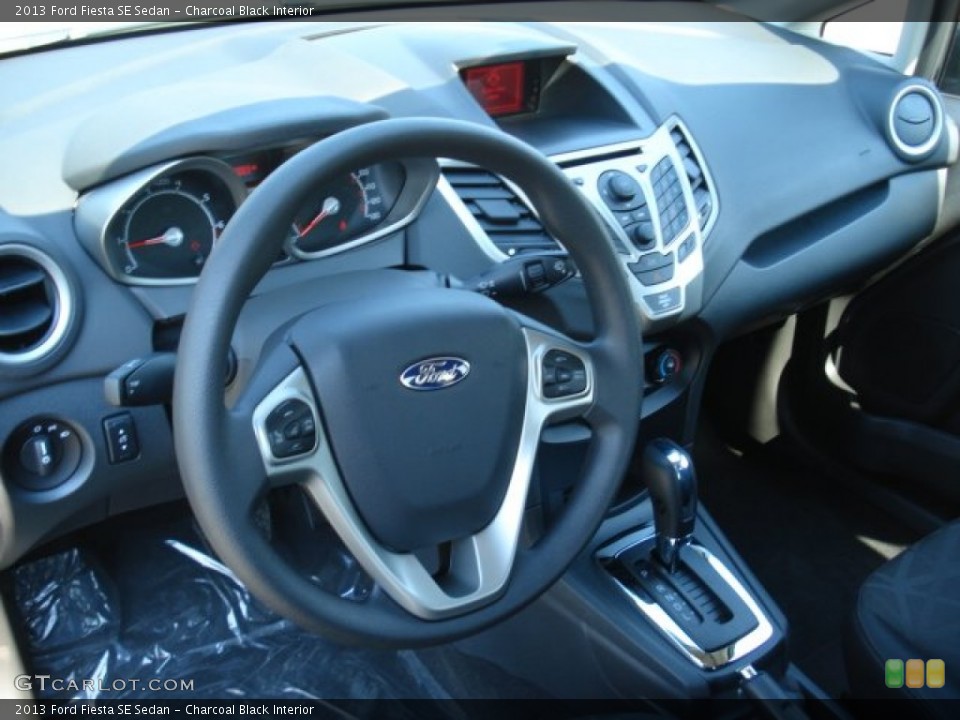 Charcoal Black Interior Dashboard for the 2013 Ford Fiesta SE Sedan #69867796