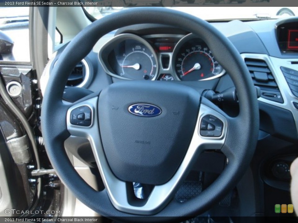 Charcoal Black Interior Steering Wheel for the 2013 Ford Fiesta SE Sedan #69867868