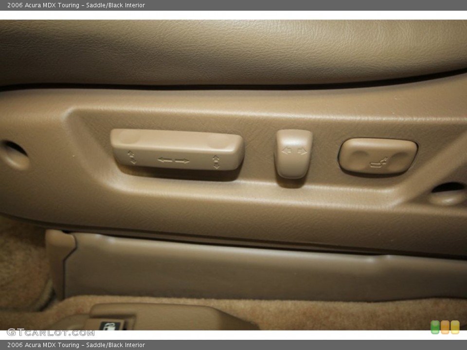Saddle/Black Interior Controls for the 2006 Acura MDX Touring #69868492