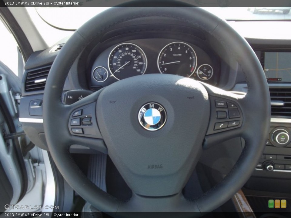 Oyster Interior Steering Wheel for the 2013 BMW X3 xDrive 28i #69880518