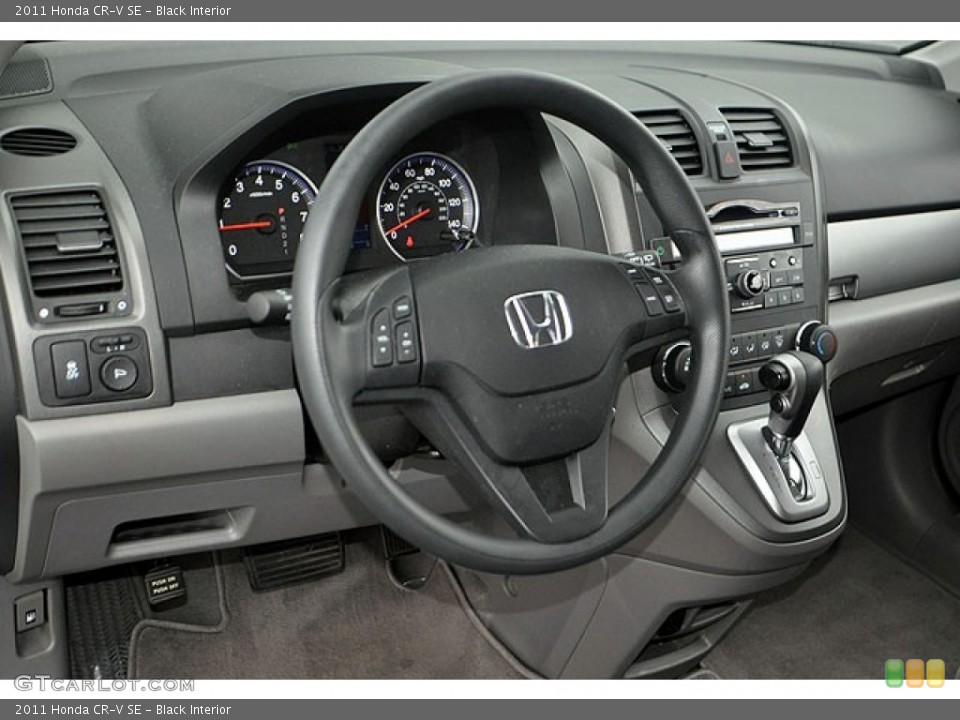 Black Interior Dashboard for the 2011 Honda CR-V SE #69910292