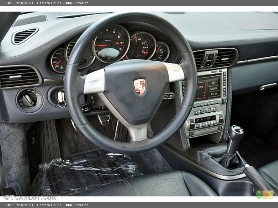 Black Interior Steering Wheel for the 2005 Porsche 911 Carrera Coupe #69910529