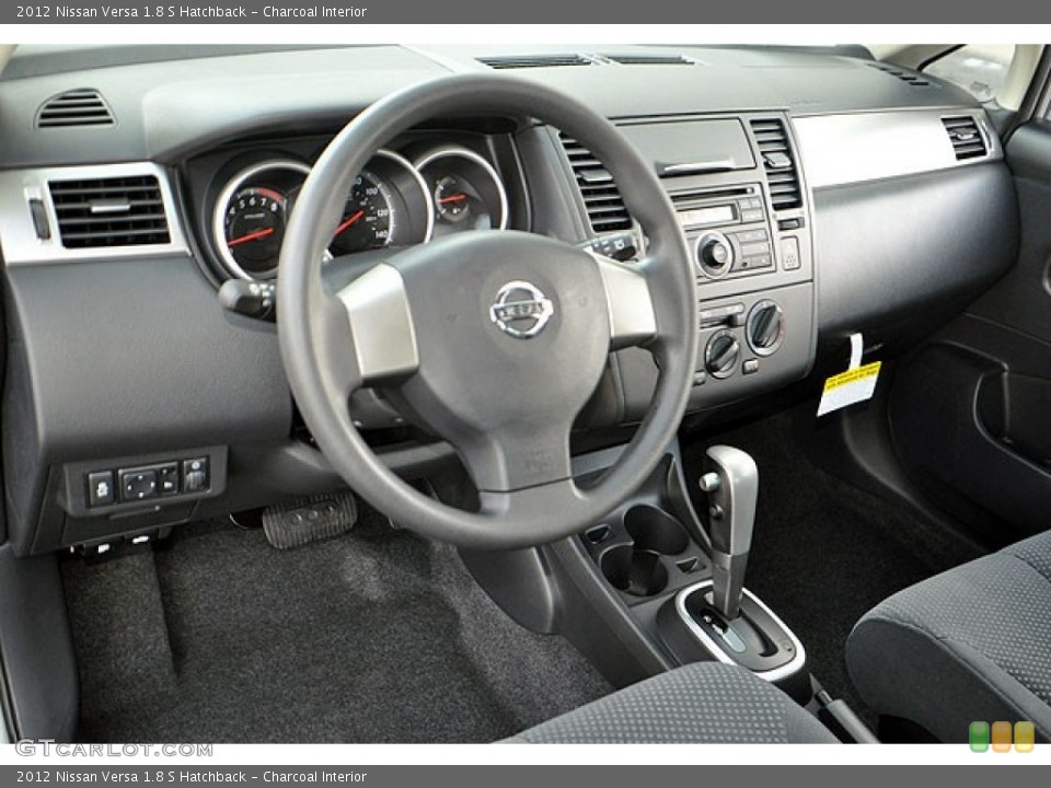 Charcoal Interior Dashboard for the 2012 Nissan Versa 1.8 S Hatchback #69938366