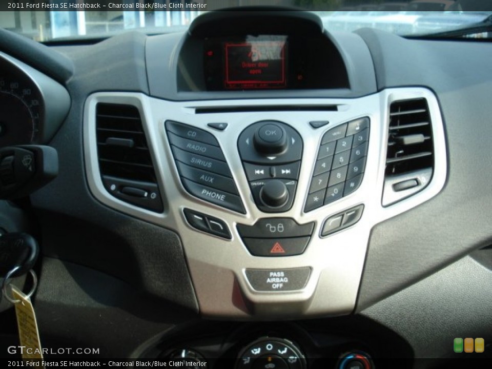 Charcoal Black/Blue Cloth Interior Controls for the 2011 Ford Fiesta SE Hatchback #69963862