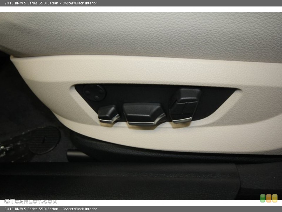Oyster/Black Interior Controls for the 2013 BMW 5 Series 550i Sedan #69964270