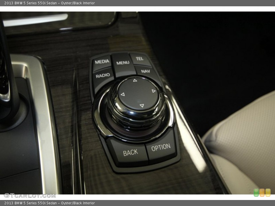 Oyster/Black Interior Controls for the 2013 BMW 5 Series 550i Sedan #69964306