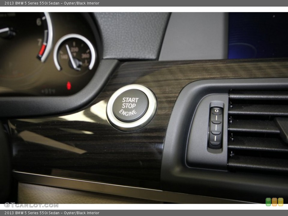 Oyster/Black Interior Controls for the 2013 BMW 5 Series 550i Sedan #69964324