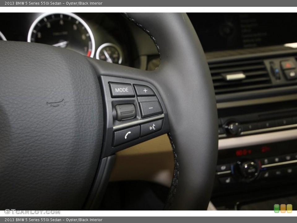 Oyster/Black Interior Controls for the 2013 BMW 5 Series 550i Sedan #69964333