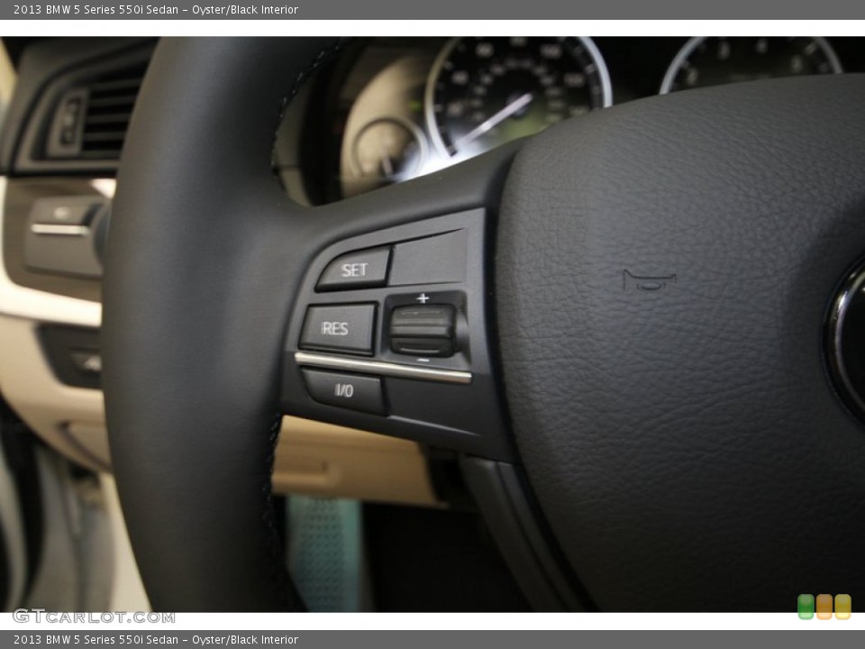 Oyster/Black Interior Controls for the 2013 BMW 5 Series 550i Sedan #69964342