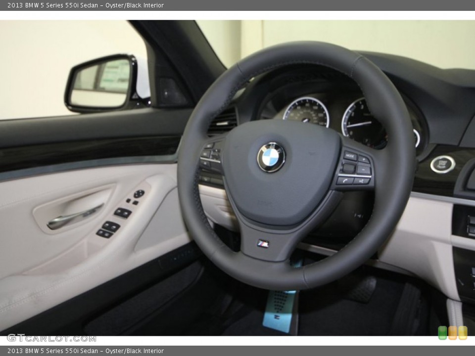 Oyster/Black Interior Steering Wheel for the 2013 BMW 5 Series 550i Sedan #69964369