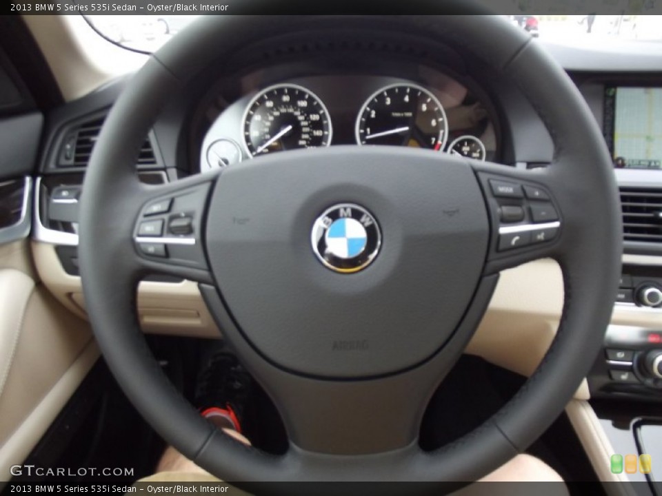 Oyster/Black Interior Steering Wheel for the 2013 BMW 5 Series 535i Sedan #69968584