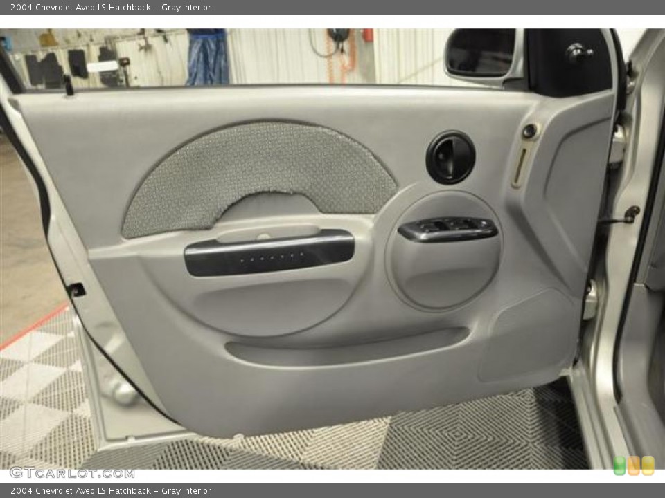 Gray Interior Door Panel for the 2004 Chevrolet Aveo LS Hatchback #69970405