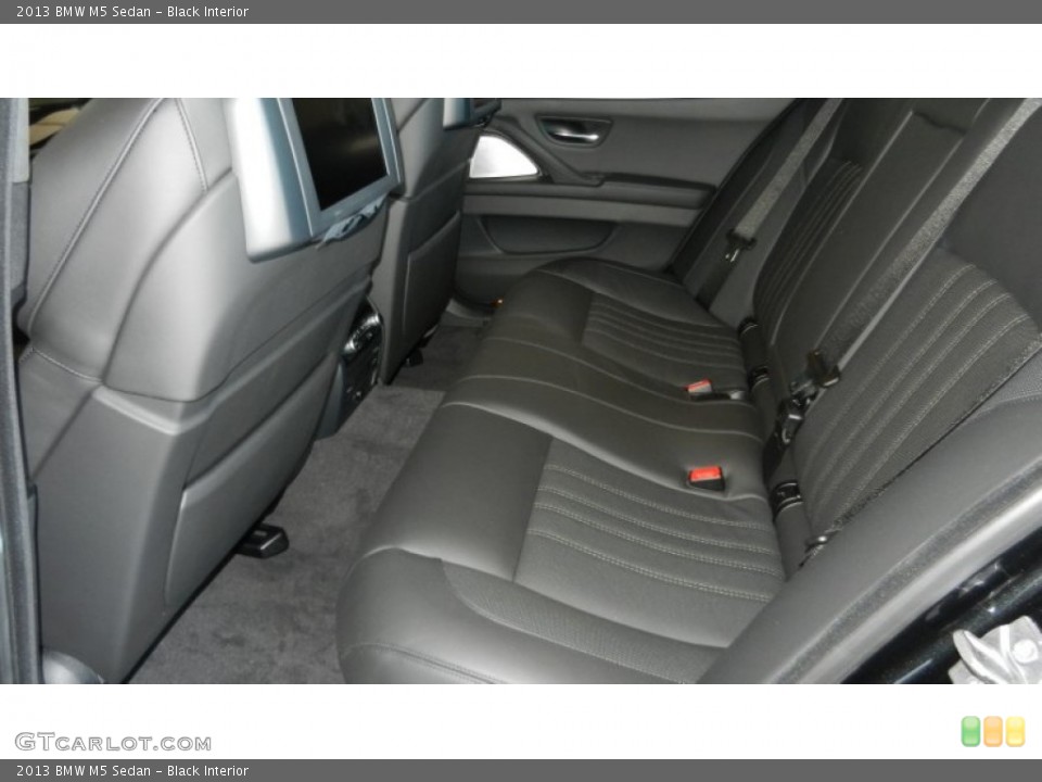 Black Interior Rear Seat for the 2013 BMW M5 Sedan #69971677