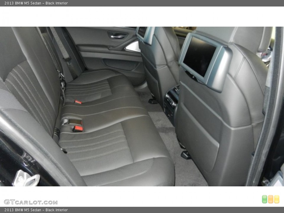 Black Interior Rear Seat for the 2013 BMW M5 Sedan #69971686