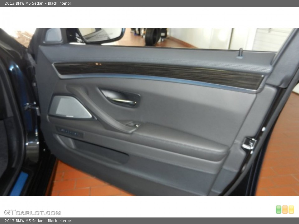 Black Interior Door Panel for the 2013 BMW M5 Sedan #69971734