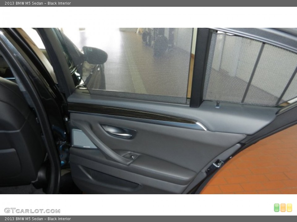 Black Interior Door Panel for the 2013 BMW M5 Sedan #69971749