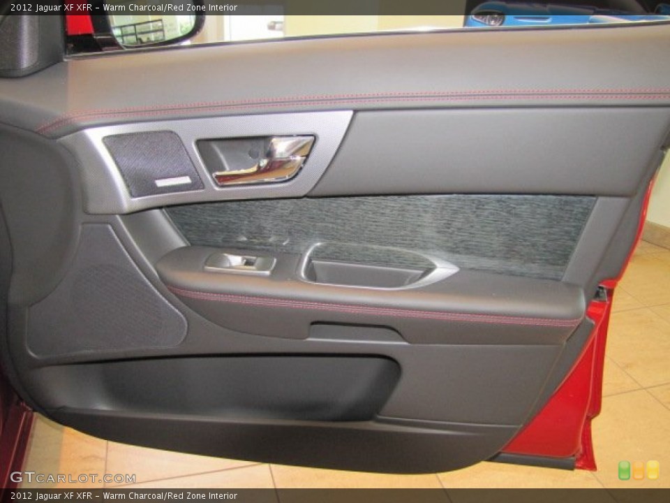 Warm Charcoal/Red Zone Interior Door Panel for the 2012 Jaguar XF XFR #69991429