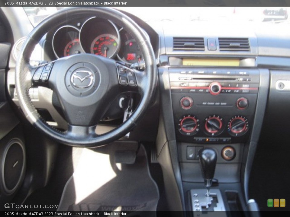 Black Interior Dashboard for the 2005 Mazda MAZDA3 SP23 Special Edition Hatchback #69999622