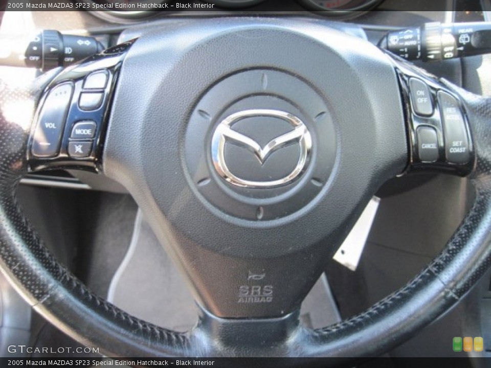 Black Interior Steering Wheel for the 2005 Mazda MAZDA3 SP23 Special Edition Hatchback #69999646