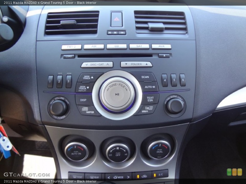 Black Interior Controls for the 2011 Mazda MAZDA3 s Grand Touring 5 Door #70068027